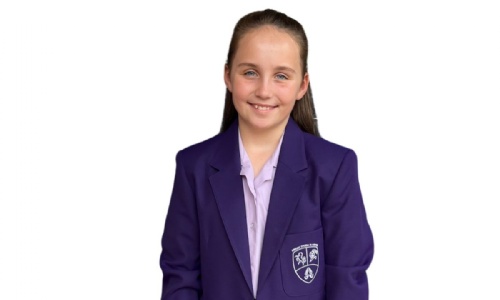 Pupil in purple school uniform