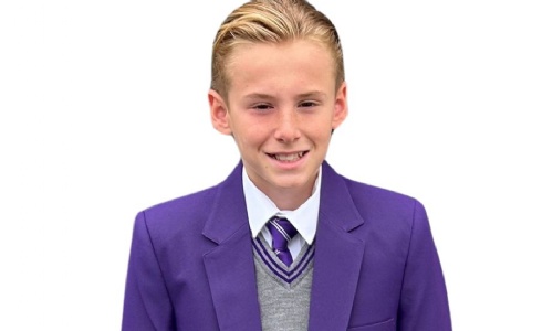 Pupil in purple school uniform